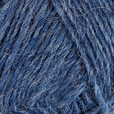 A close up photo of blue Istex Lettlopi yarn