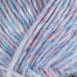A close up photo of light blue Istex Lettlopi yarn