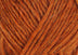 A close up photo of orange Istex Lettlopi yarn