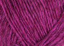A close up photo of magenta Istex Lettlopi yarn