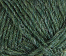 A close up photo of dark green Istex Lettlopi yarn