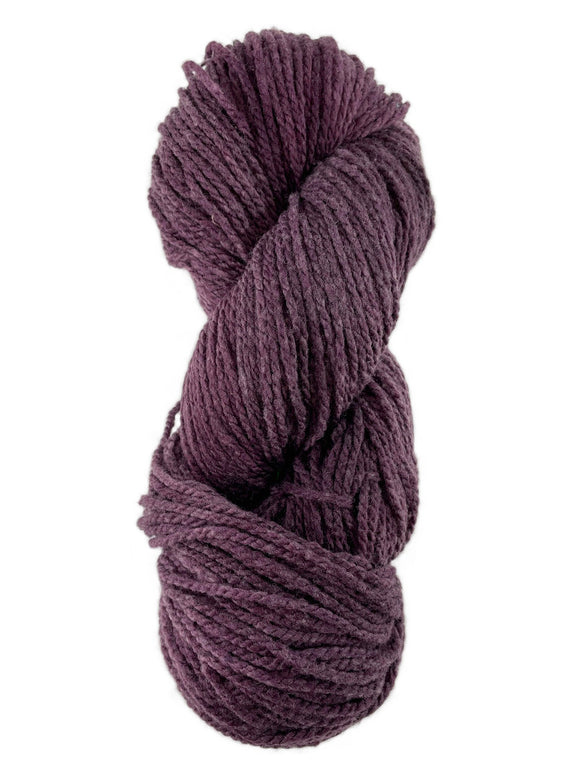 A purple skein of Mountain Meadow Wool Laramie yarn