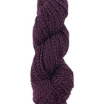 A purple marled skein of Mountain Meadow Wool Cora yarn