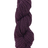 A purple marled skein of Mountain Meadow Wool Cora yarn