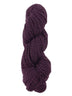 A purple marled skein of Mountain Meadow Wool Cora yarn