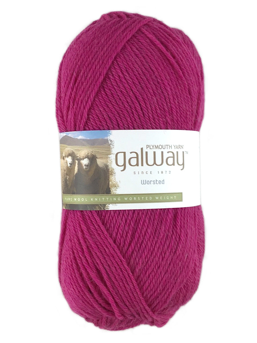 A pink skein of Plymouth Galway yarn
