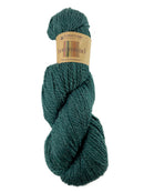 A green skein of Plymouth Homestead yarn