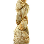 An orange skein of Mountain Meadow Wool Cora yarn
