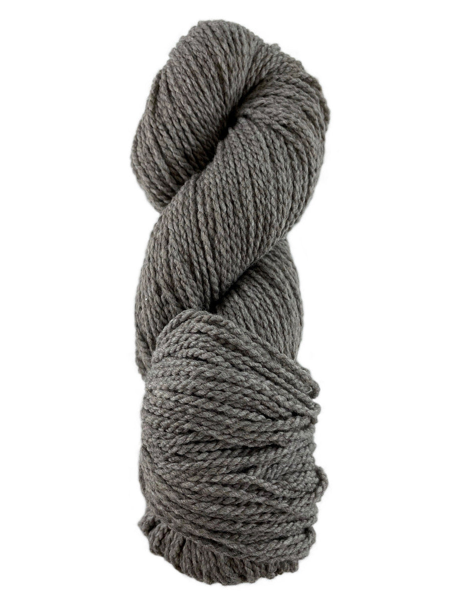 A dark grey skein of Mountain Meadow Wool Laramie Natural yarn