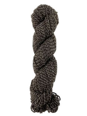 A neutral tweed skein of Mountain Meadow Wool Tweed Sport yarn