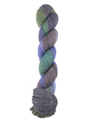 A multi-color light purple, green, and dark gray skein of Mountain Meadow Wool Green River yarn