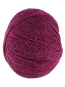 A dark pink skein of Queensland Collection Kathmandu yarn