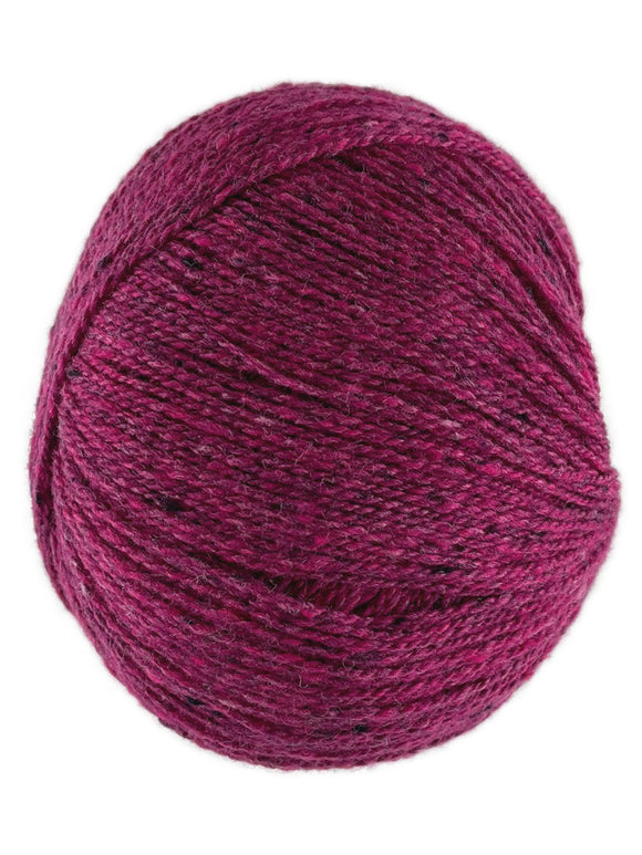 A dark pink skein of Queensland Collection Kathmandu yarn