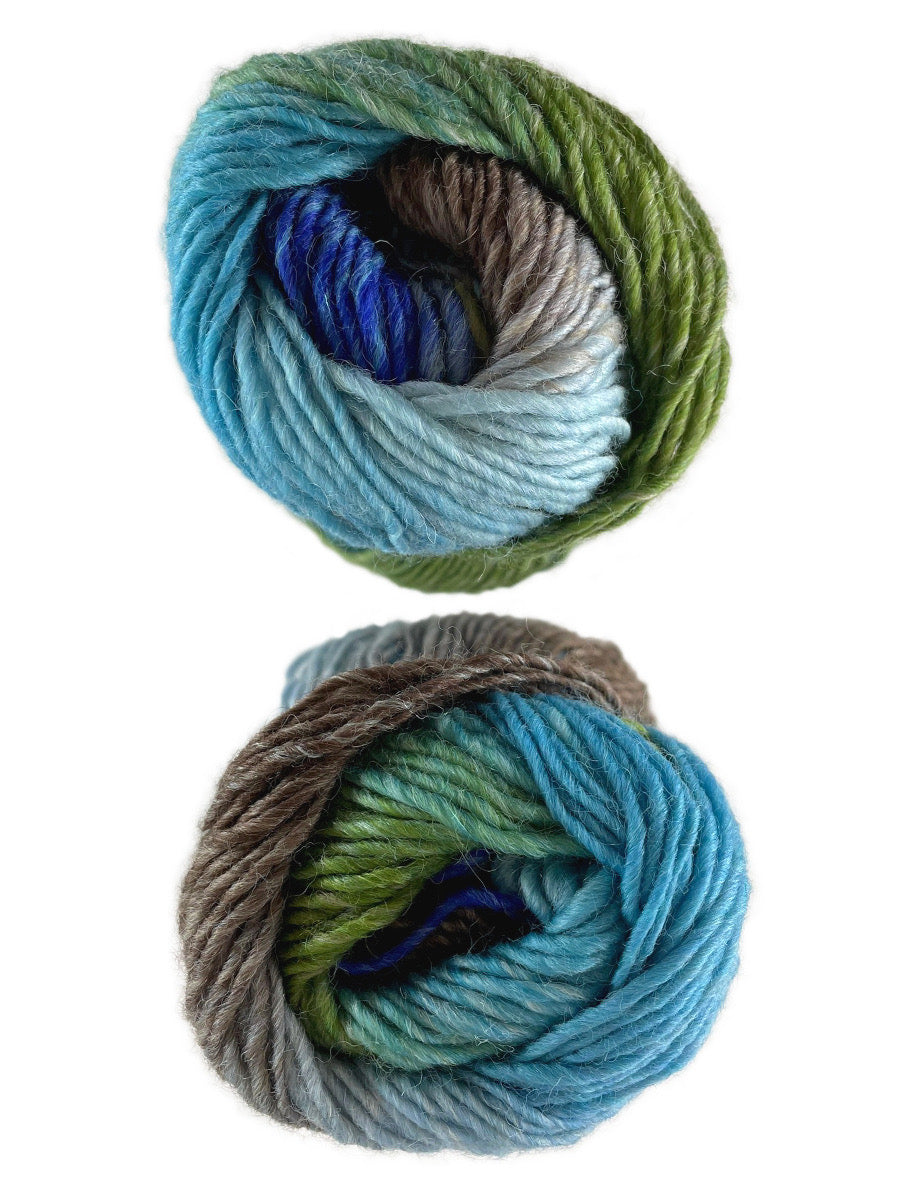 A photo of two blue, green and brown skeins of yarn