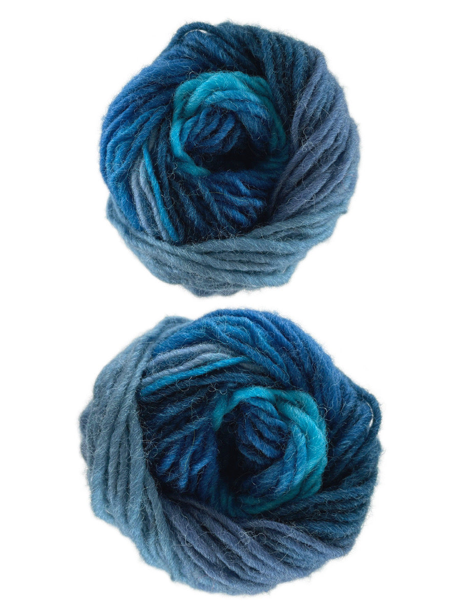 A photo of two colorful blue skeins of yarn