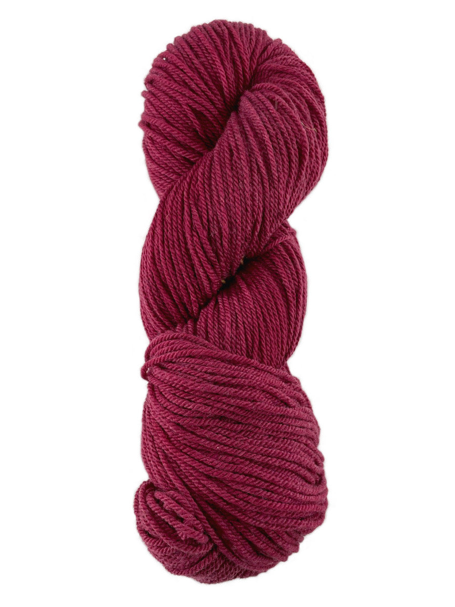 A red hank of the Mountain Meadow Wool Alpine collection.
