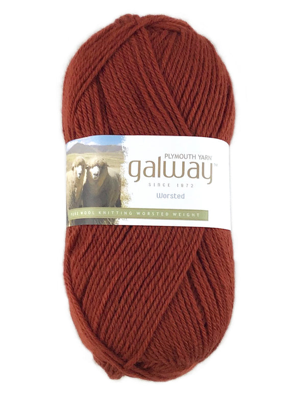 An orange skein of Plymouth Galway yarn