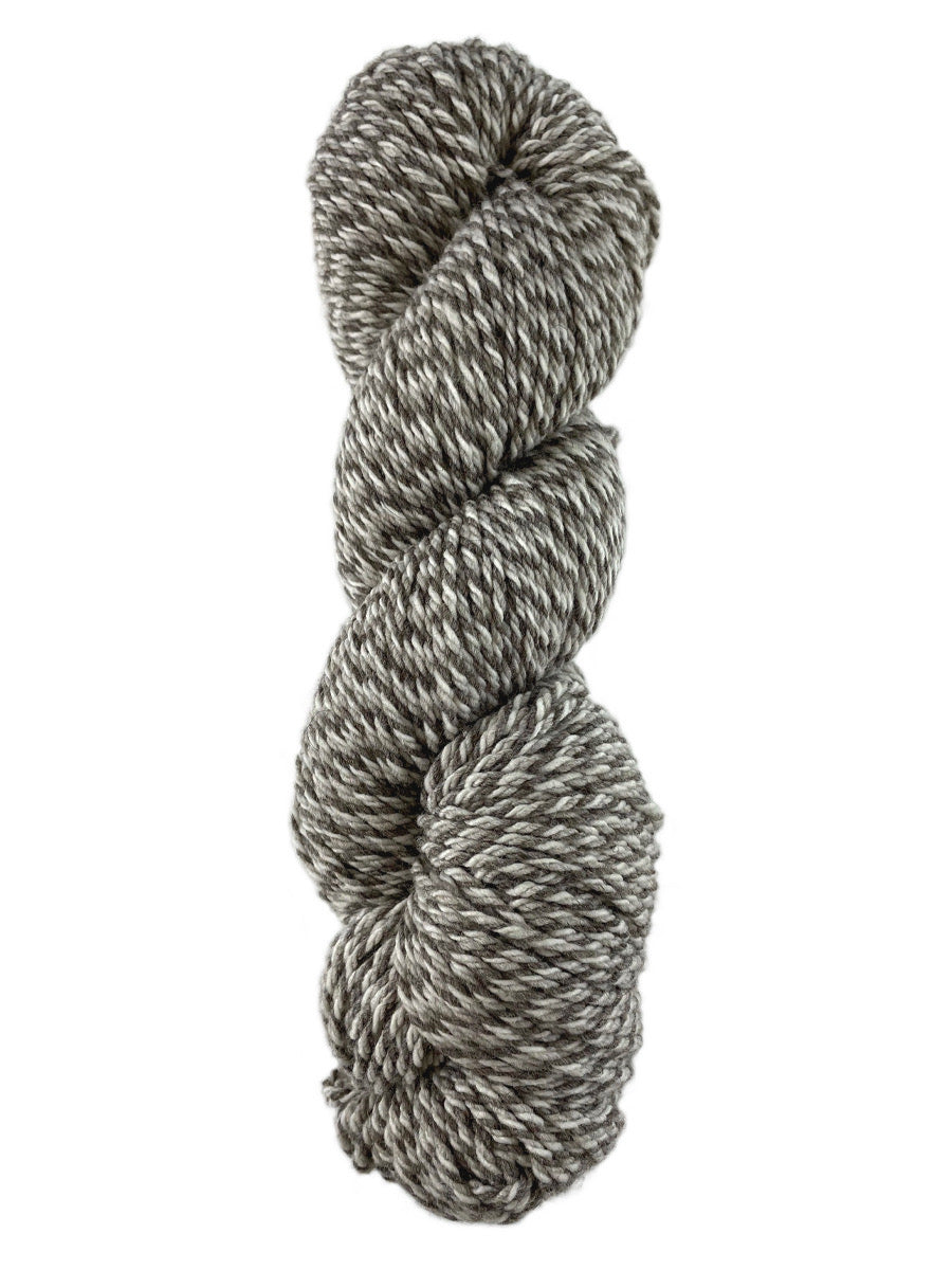 A neutral tweed skein of Mountain Meadow Wool Tweed Worsted yarn