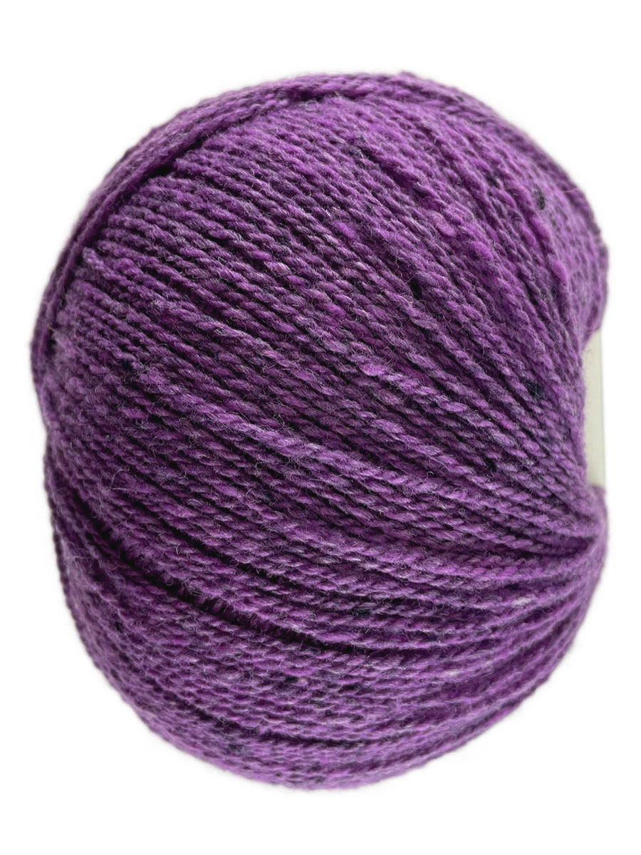 A purple skein of Queensland Collection Kathmandu yarn