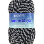 A black and gray skein of Plymouth Encore Mega
