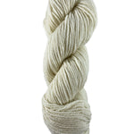 A white skein of Mountain Meadow Wool Cora yarn