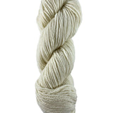 A white skein of Mountain Meadow Wool Cora yarn