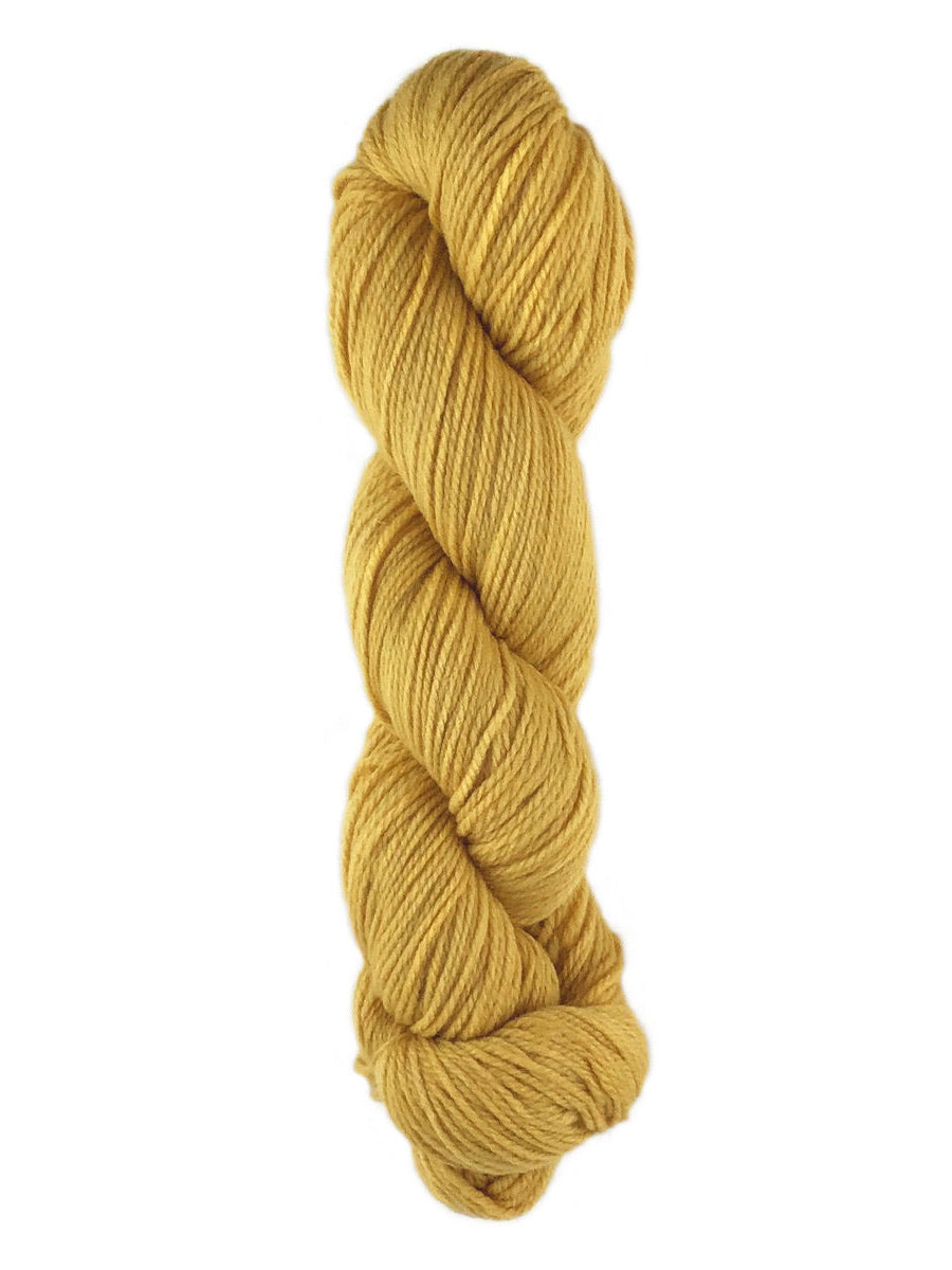 A yellow skein of Brown Sheep Prairie Spun DK yarn