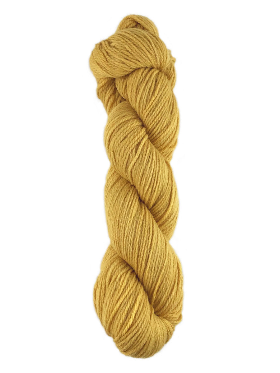 A yellow skein of Brown Sheep Prairie Spun DK yarn