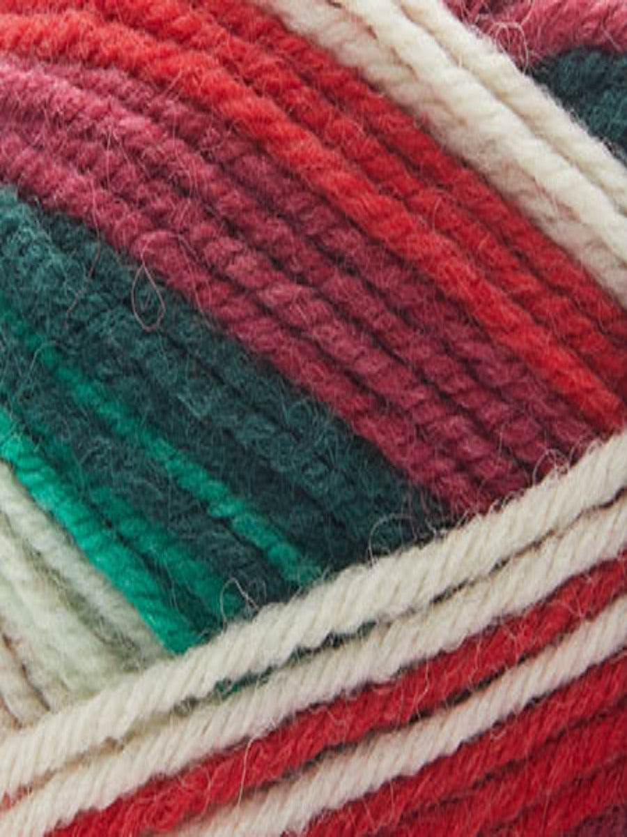Close up of a skein of Deluxe Stripes in colorway 310 Poinsettia 