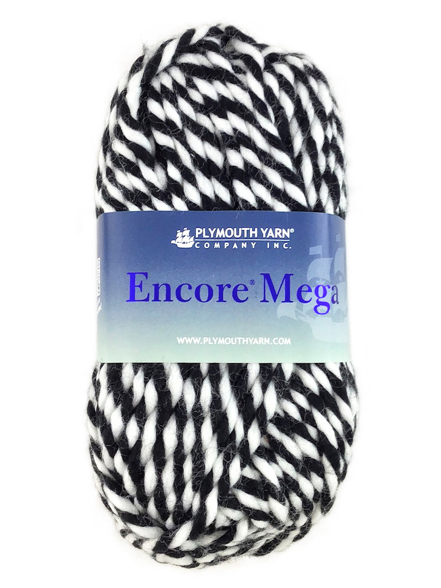 A black and white skein of Plymouth Encore Mega yarn