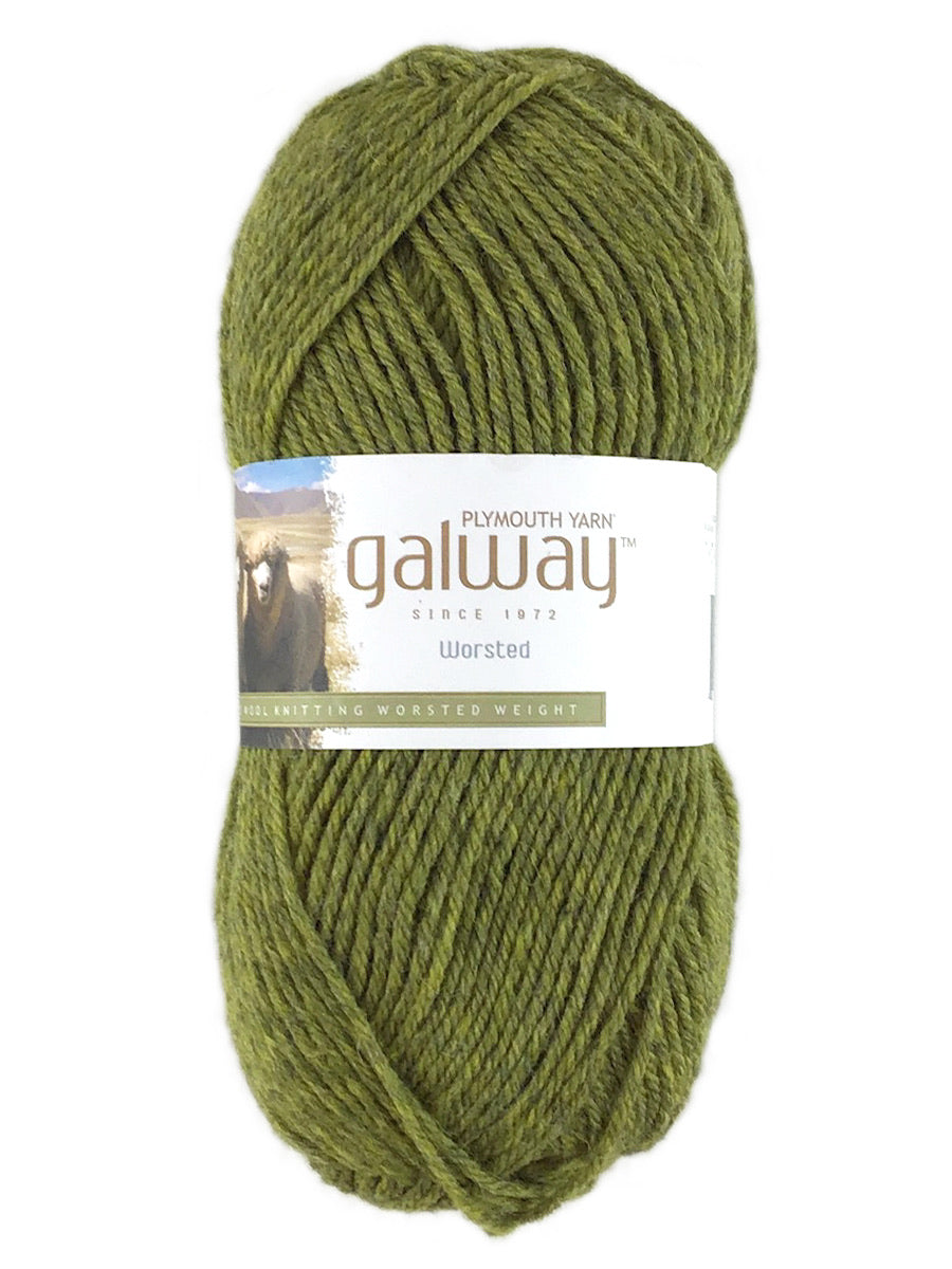 A green skein of Plymouth Galway yarn