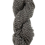 A natural marled skein of Mountain Meadow Wool Cora yarn