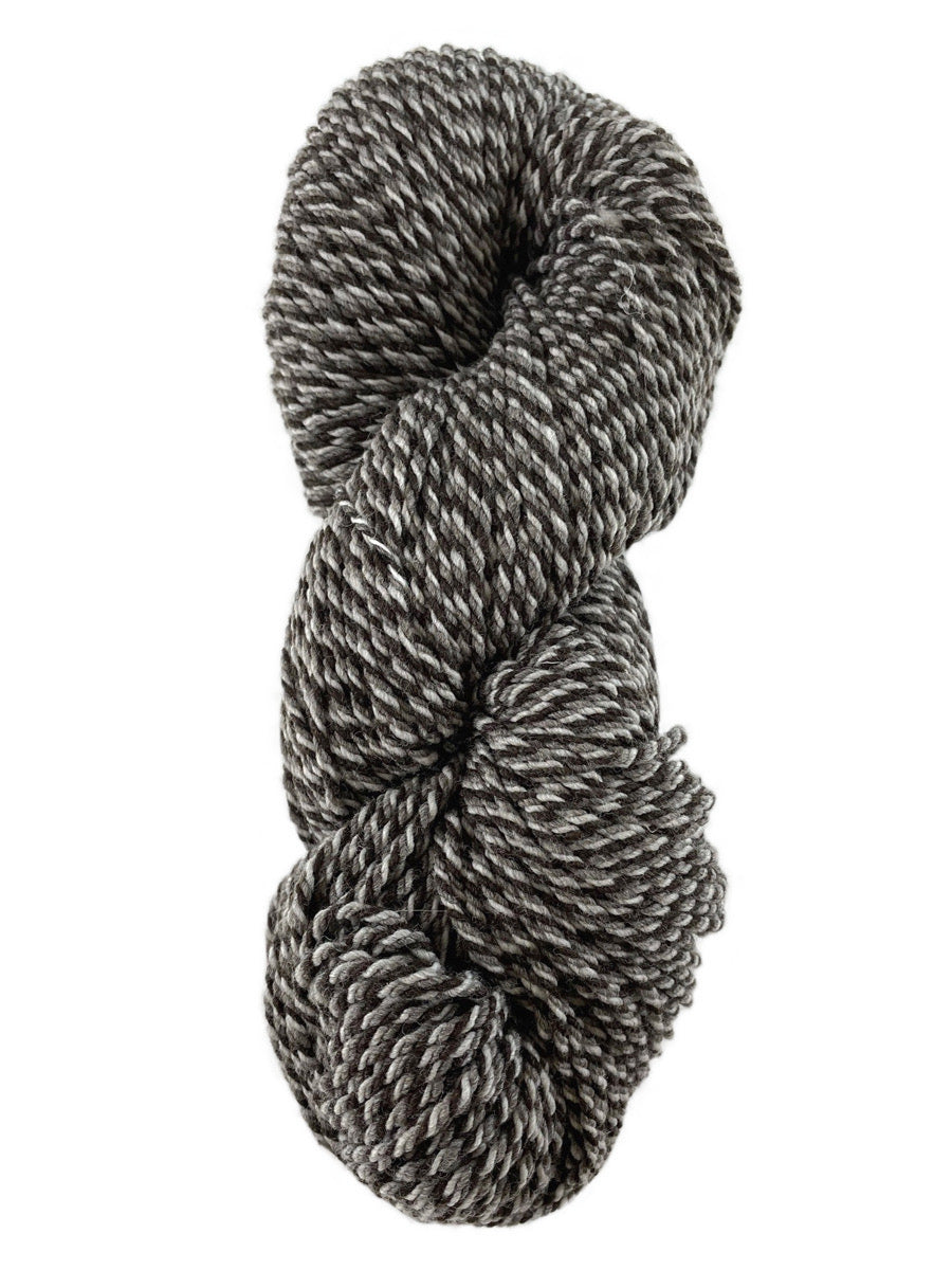 A natural marled skein of Mountain Meadow Wool Cora yarn