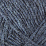 A close up photo of blue Istex Lettlopi yarn