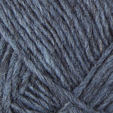 A close up photo of blue Istex Lettlopi yarn
