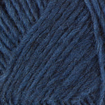 A close up photo of blue Istex Lettlopi yarn