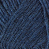 A close up photo of blue Istex Lettlopi yarn