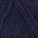 A close up photo of blue Istex Lettlopi yarn