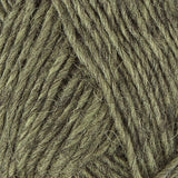 A close up photo of light tan-green Istex Lettlopi yarn