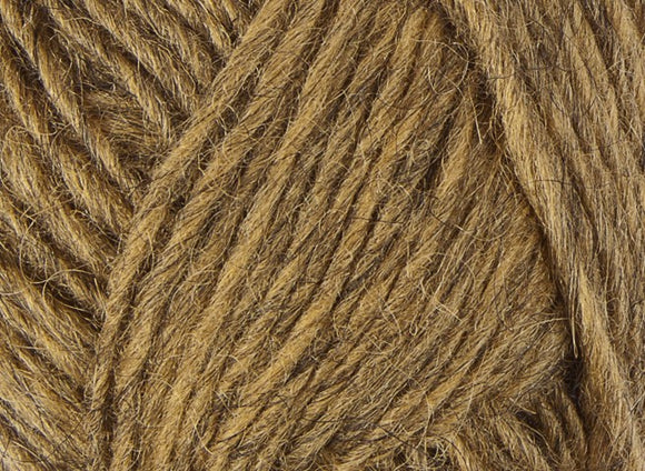 A close up photo of tan Istex Lettlopi yarn