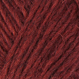 A close up photo of red Istex Lettlopi yarn