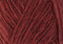 A close up photo of red Istex Lettlopi yarn
