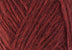 A close up photo of red Istex Lettlopi yarn