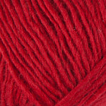 A close up photo of red Istex Lettlopi yarn
