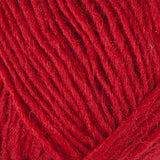 A close up photo of red Istex Lettlopi yarn