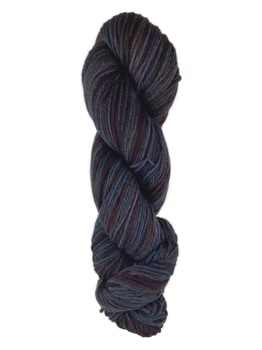 A hand painted skein of Brown Sheep Prairie Spun DK yarn
