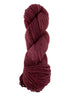 A red skein of Mountain Meadow Wool Laramie yarn