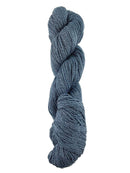A mid-toned blue skein of Mountain Meadow Wool Green River yarn