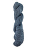 A mid-toned blue skein of Mountain Meadow Wool Green River yarn