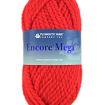 A red skein of Plymouth Encore Mega yarn